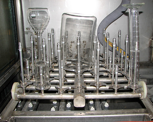 Niagara Systems parts washer - flasks on racks.