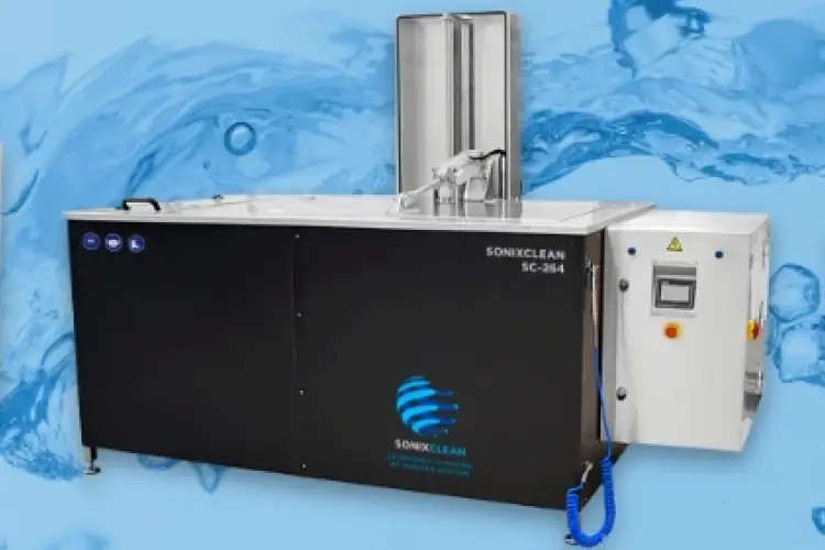 Soniclean SC-284 industrial cleaning machine with control panel, displayed against a blue water-themed background.