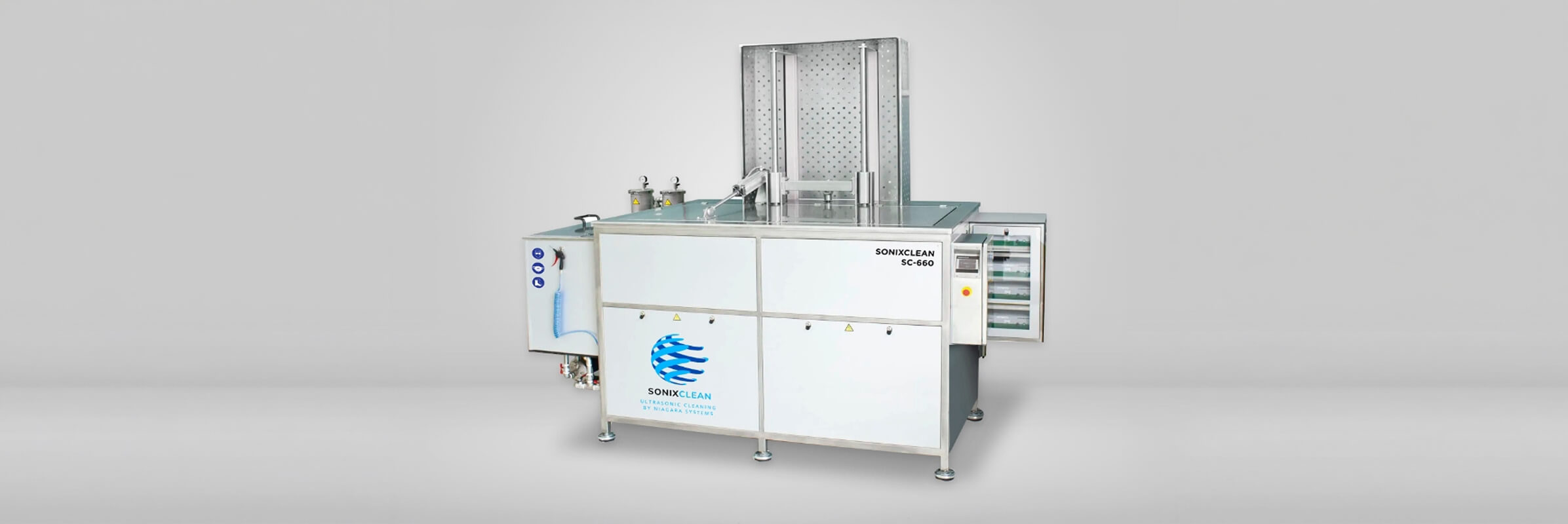 SonixClean SC-660 industrial ultrasonic cleaning system with lift mechanism.